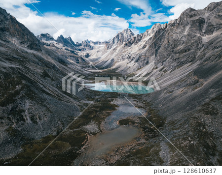 Aerial view of beautiful lake in high altitude mountains landscape 128610637