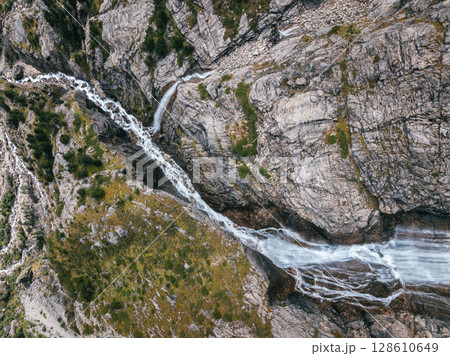 Aerial view of beautiful high altitude mountain waterfall landscape 128610649