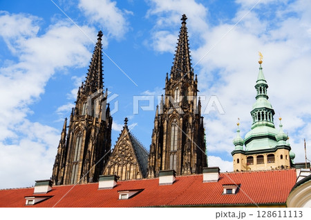 Spectacular Prague Architecture Towers and Rooftops against a Cloudy Sky, Czech Republic 128611113