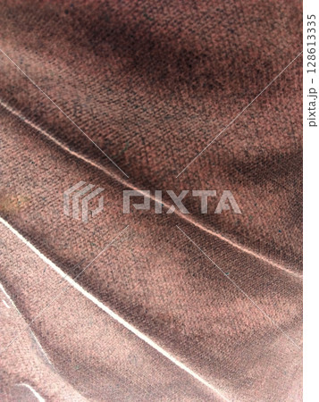 Abstract Brown Fabric Texture with Subtle Weave and Soft Lighting for Backgrounds and Design 128613335
