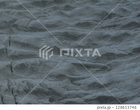 Aerial view of beautiful hanging glacier in high altitude mountains landscape 128613748