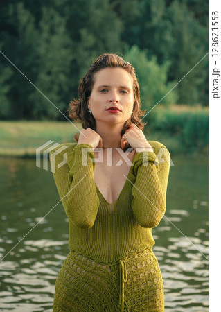 Warm afternoon by the lake captivates with natural beauty and vibrant surroundings Warm afternoon by the lake captivates with natural beauty and vibrant surroundings 128621553
