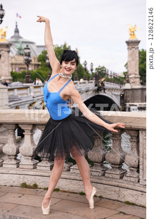 Ballet dancer posing on Pont Alexandre III bridge in Paris Ballet dancer posing on Pont Alexandre III bridge in Paris 128622146