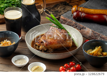 Pork knuckle with sauces cabbage and potatoes 128622679