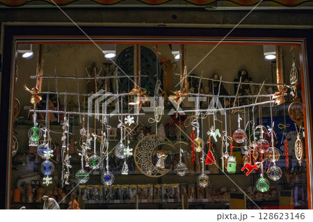 Christmas Fair selling glass handmade baubles, ceramic toys on market square 128623146