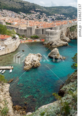 panoramic of Dubrovnik West Harbour, in Croatia. Castle walls and bastion on background panoramic of Dubrovnik West Harbour, in Croatia. Castle walls and bastion on background 128627137