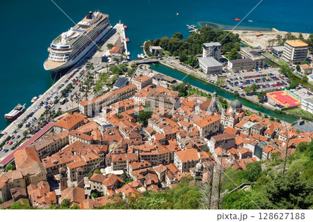 high angle over Kotor old town buildings and sea bay. Montenegro, Europe 128627188