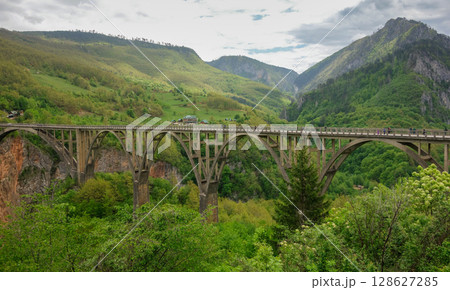 panoramic of Durdevica Tara Bridge, concrete arch bridge over Tara River in northern Montenegro, Europe 128627285