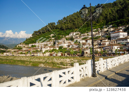 old Gorica bridge over Osum river in Berat, Albania. cityscape as backdrop old Gorica bridge over Osum river in Berat, Albania. cityscape as backdrop 128627438
