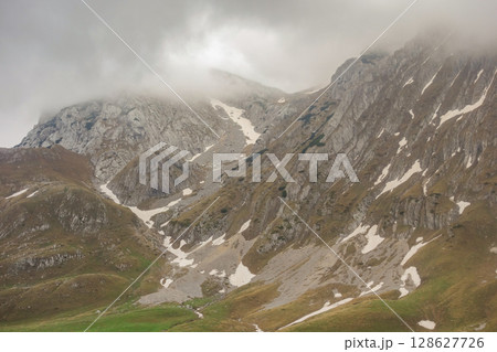 mountainscape in Durmitor National Park, Zabljak, Montenegro, at cloudy weather mountainscape in Durmitor National Park, Zabljak, Montenegro, at cloudy weather 128627726