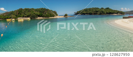 incredible paradise beach in Ksamil, Albanian rivieira. Panoramic incredible paradise beach in Ksamil, Albanian rivieira. Panoramic 128627950