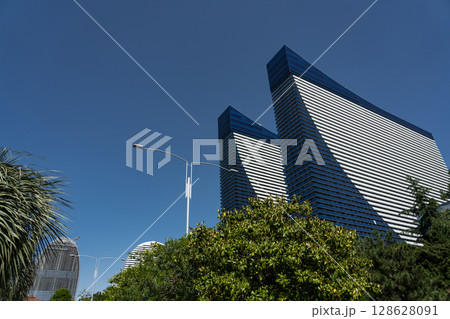 Hotel buildings in Batumi against a clear sky 128628091