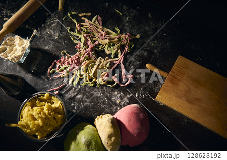 Colorful Homemade Pasta Preparation Featuring Traditional Italian Techniques and Ingredients 128628192