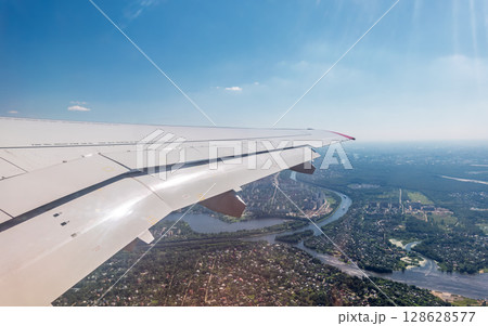View from the airplane window during takeoff at Sheremetyevo airport at summer 128628577