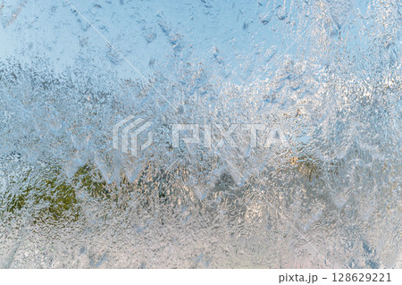 Aqua background. Product space next to clean water streams and water splashes and drops. 128629221
