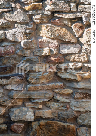 Backgrounds of the old stone wall. 128629273