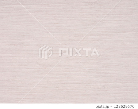 Whispers of serenity in a soft pink hue, the paper's texture holds the tender promise of morning's first light Whispers of serenity in a soft pink hue, the paper's texture holds the tender promise of morning's first light 128629570