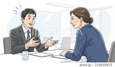 打ち合わせをするビジネスマンとビジネスウーマン 128630913