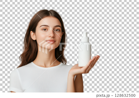 Close up of a neutral hand holding a matte finish glass skincare bottle against a clean white background The product packaging is simple and modern showcasing a minimalist design for a natural 128632500