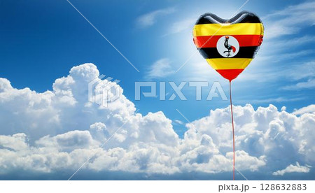 ウガンダの国旗のハート型の風船と青空 ウガンダの国旗のハート型の風船と青空 128632883