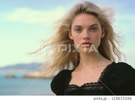 Fashion portrait of beautiful blond woman on beach wearing black designer dress.AI Generative 128633288