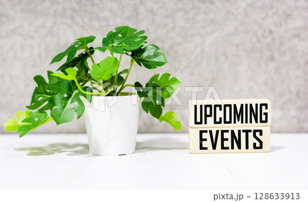 A message about the concept of upcoming events on the blocks and the table 128633913