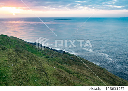 Aerial view of Dunmore Head by Portnoo in County Donegal, Ireland. 128633971