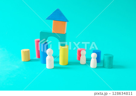 Wooden figure standing ,Colorful toy house wood brick for kids. 128634811
