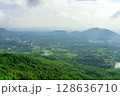 View of the beautiful jungle depths of Yanoda Park on Hainan Island, China. 128636710