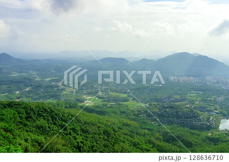 View of the beautiful jungle depths of Yanoda Park on Hainan Island, China. 128636710