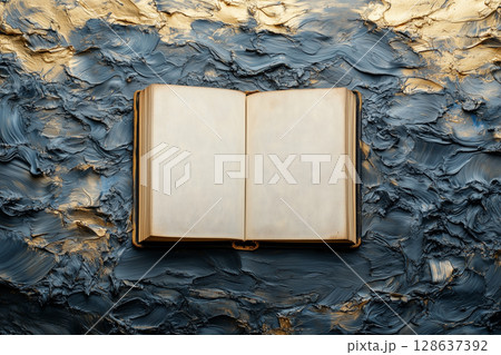 Open book displaying blank pages against textured blue gold surface, World Knowledge Day copy space mockup Open book displaying blank pages against textured blue gold surface, World Knowledge Day copy space mockup 128637392
