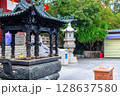Hainan Island, Sanya: Nanshan Buddhist Center. View of the incense burner in front of the Temple 128637580