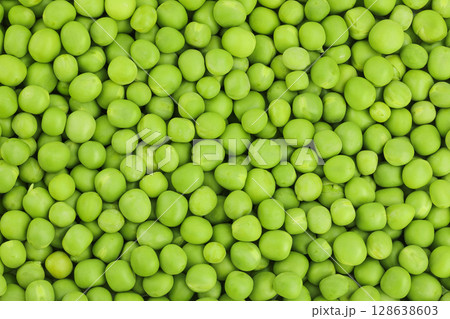 Fresh green peas as a background. Top view. Flat lay 128638603