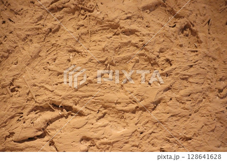 A Textured Earth Surface Showcasing Beautiful Natural Patterns and Rich Earthy Tones 128641628
