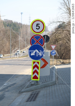 Traffic Signs That Indicate Road Directions and Limits for Various Vehicles and Pedestrians 128641663