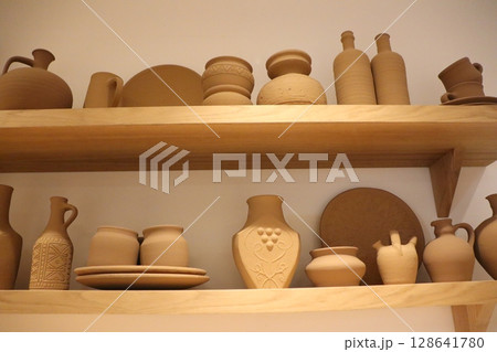 Explore our Elegant Handmade Clay Pottery Collection with artistic designs crafted with care 128641780