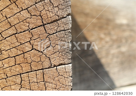 Closeup of Cracked Wood Texture, showing intricate details in Natural Light for beauty Closeup of Cracked Wood Texture, showing intricate details in Natural Light for beauty 128642030