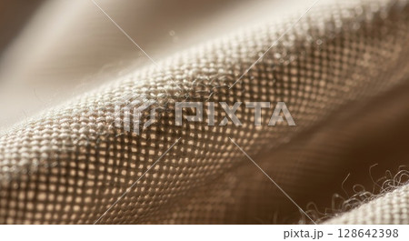 Macro Texture of Woven Fabric Mesh with Intricate Weave Pattern and Soft Lighting 128642398