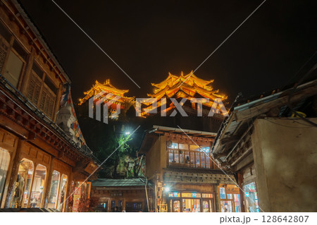 Illuminated pagodas at night in Dukezong Ancient Town, Shangri-La, China Illuminated pagodas at night in Dukezong Ancient Town, Shangri-La, China 128642807