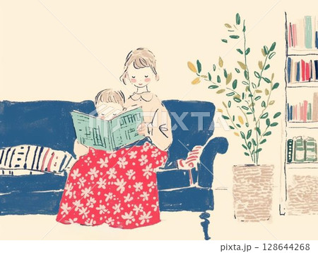 ソファで読み聞かせを楽しむ親子の時間 ソファで読み聞かせを楽しむ親子の時間 128644268