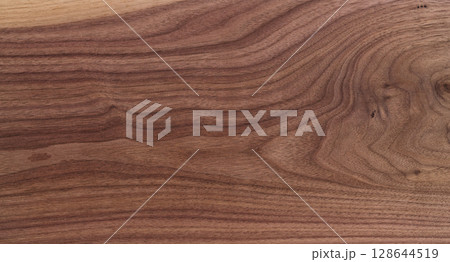 Texture of black walnut solid board untreated Texture of black walnut solid board untreated 128644519