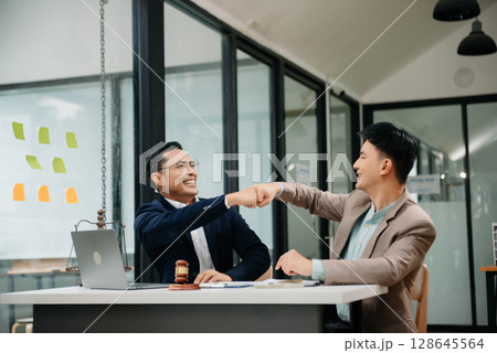 Business and Male lawyer or judge consult having team meeting with client, Law and Legal services concept.Customer service good cooperation in office 128645564