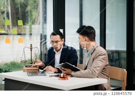Business and Male lawyer or judge consult having team meeting with client, Law and Legal services concept.Customer service good cooperation in office 128645570