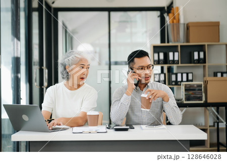 Portrait of success business people working together in office. Portrait of success business people working together in office. 128646028