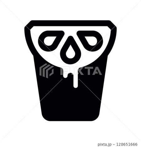 Lemon ice cream in a cup with a citrus slice and melting drips Lemon ice cream in a cup with a citrus slice and melting drips 128651666