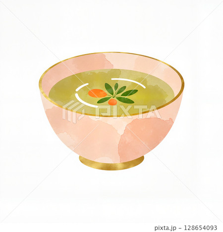 Colorful soup bowl with olive accents on white background, culinary art 128654093