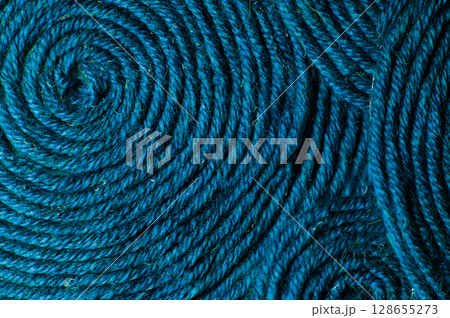 Detailed texture of abstract background. Thread made of natural materials, macro shot. DIY background, handcraft advertising concept Detailed texture of abstract background. Thread made of natural materials, macro shot. DIY background, handcraft advertising concept 128655273