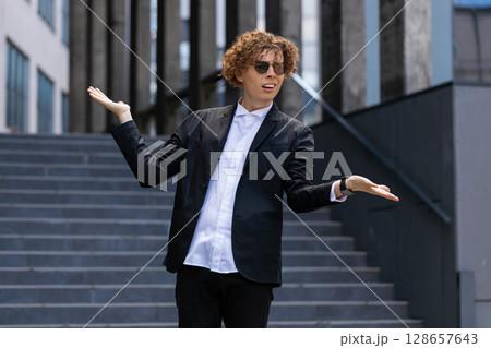 Confused business man feeling embarrassed about ambiguous question, having doubts, no answer idea 128657643