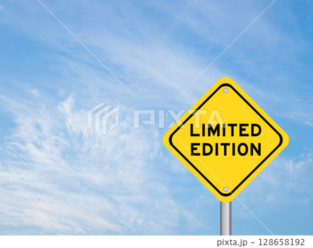 Yellow transportation sign with word limited edition on blue color sky background Yellow transportation sign with word limited edition on blue color sky background 128658192