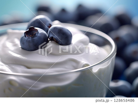 Yogurt dessert in glass bowl with fresh raw ripe blueberries.Macro.AI Generative 128658486